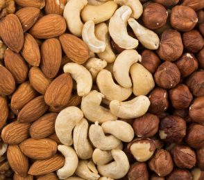 U.S. adults put on about a pound a year on average. But people who had a regular nut-snacking habit put on less weight and had a lower risk of becoming obese over time, a new study finds.